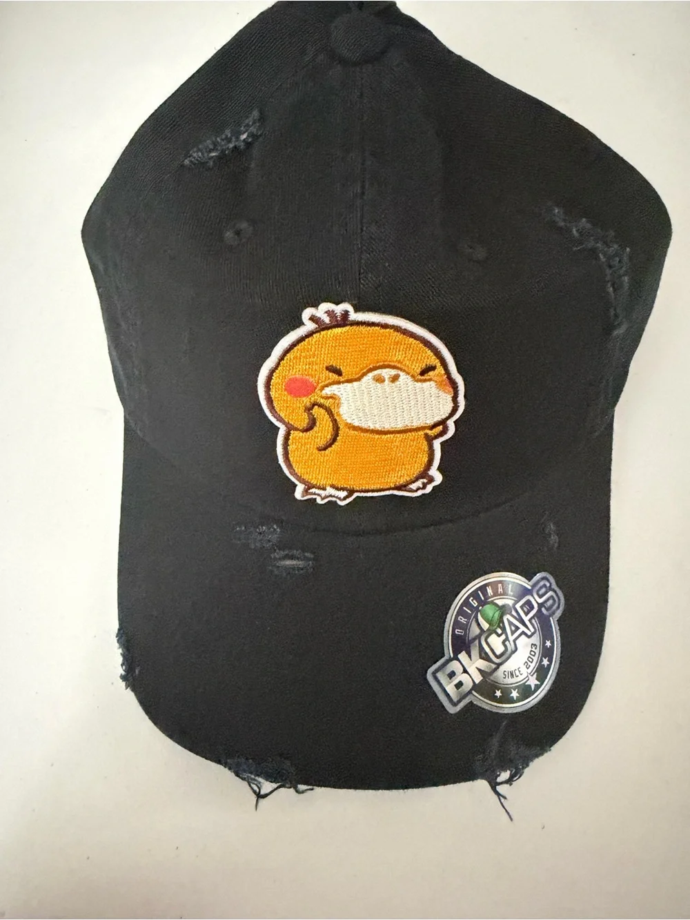 Black Distressed Cap pokemon pysduck